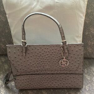 New Guess Bag with extra cross body strap .